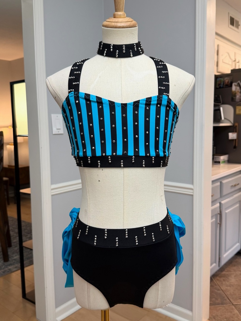 Teal and black striped costume CL